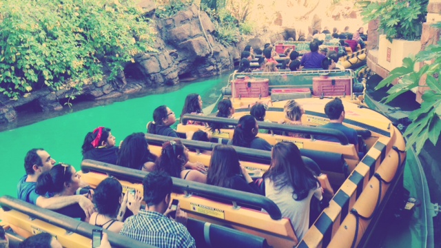 Riders await the unloading bay at the Jurassic Park River Adventure ride at Universal Studios. They've been waiting "fucking forever."