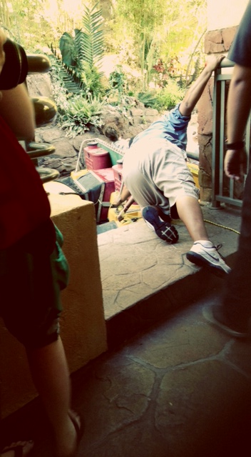 Pictured: Some guy trying to pull the raft toward the opening of the gate barrier.